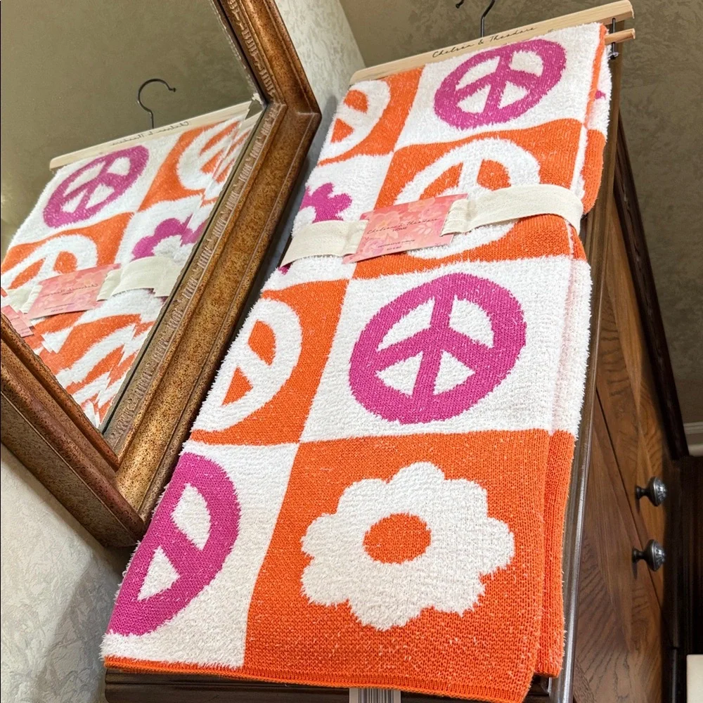 Chelsea & Theodore Peace Symbol & Flower Decrative Throw. Orange Pink & White.